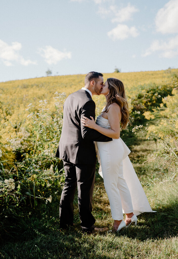 flower field wedding photos with bride and groom romantic