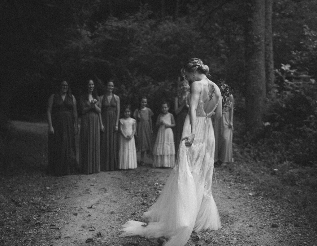 first look with bridesmaids fall rustic colors