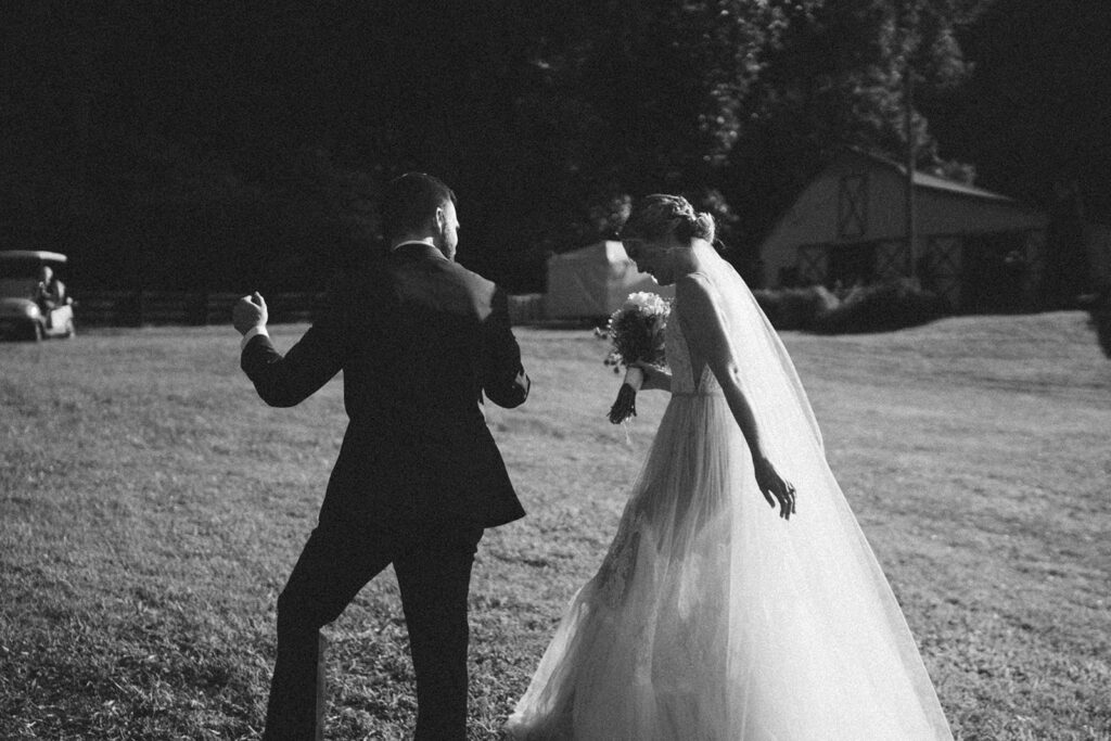 bride and groom walking back down the aisle after ceremony