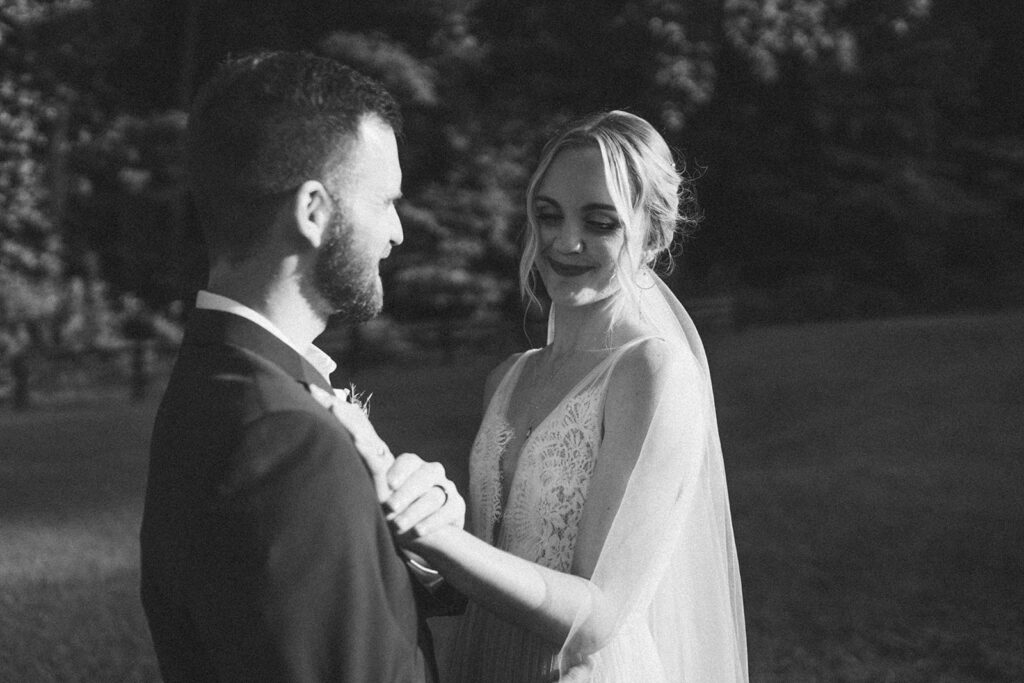 golden hour wedding portraits with bride and groom at the fields of blackberry cove