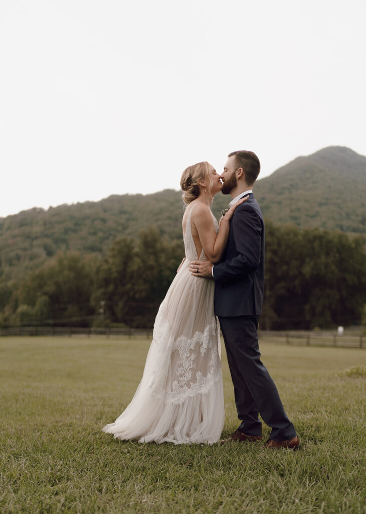 timeless and romantic couple photos in the blue ridge mountains with bride and groom at the fields of blackberry cove