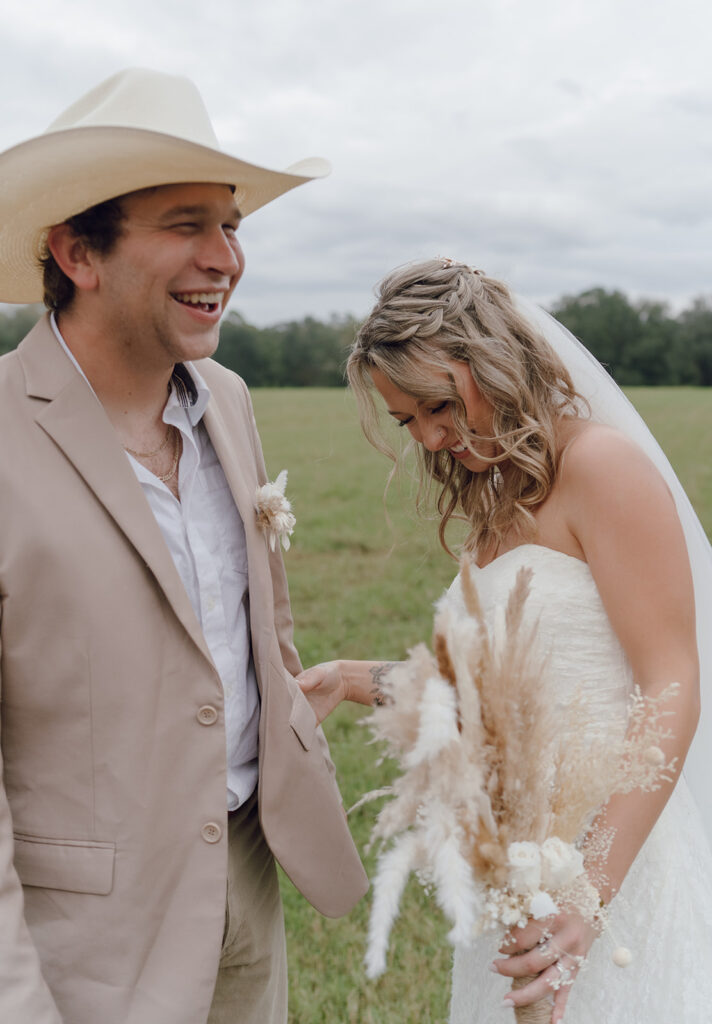 outdoor bride and groom portraits in a field