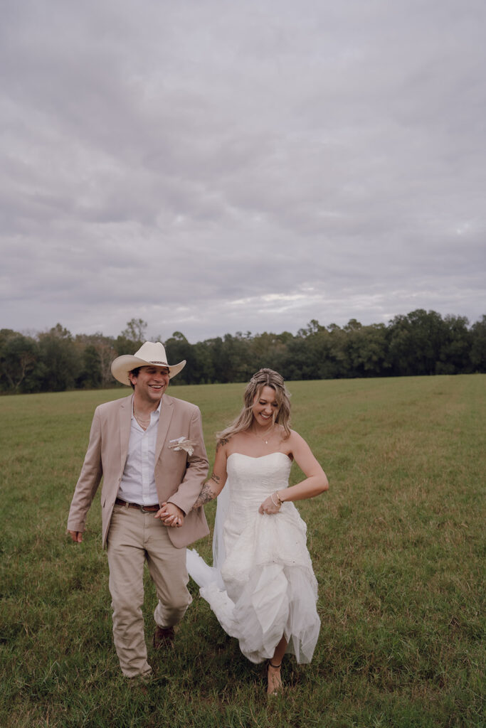 documentary style field wedding photos with the bride and groom