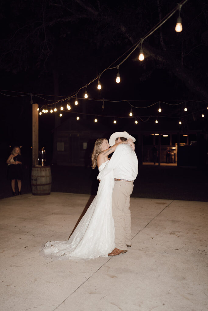bride and groom first dance barn wedding reception