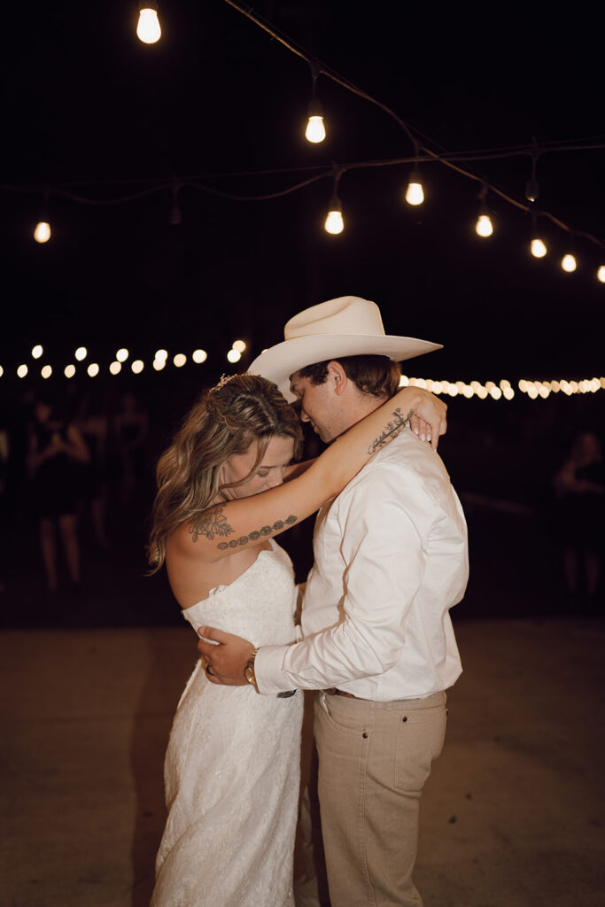bride and groom first dance barn wedding reception