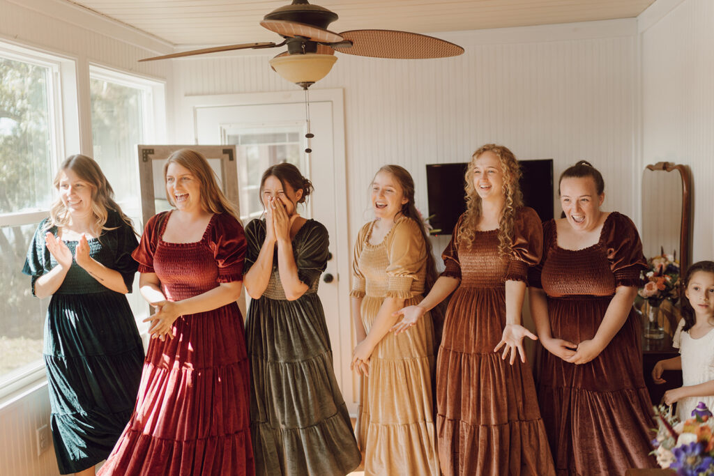 first look with bridesmaids reaction