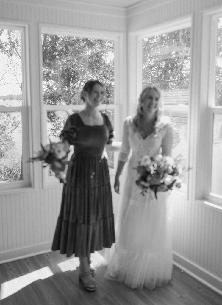 bride with bridesmaid candid photos
