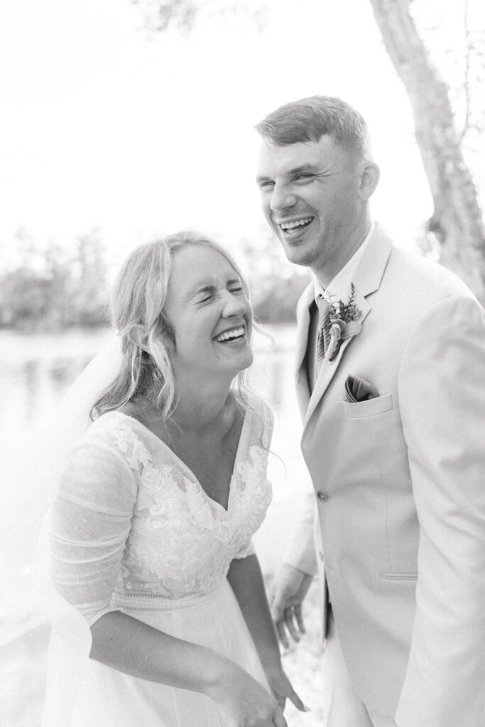 bride and groom photos outdoors lakeside wedding portraits