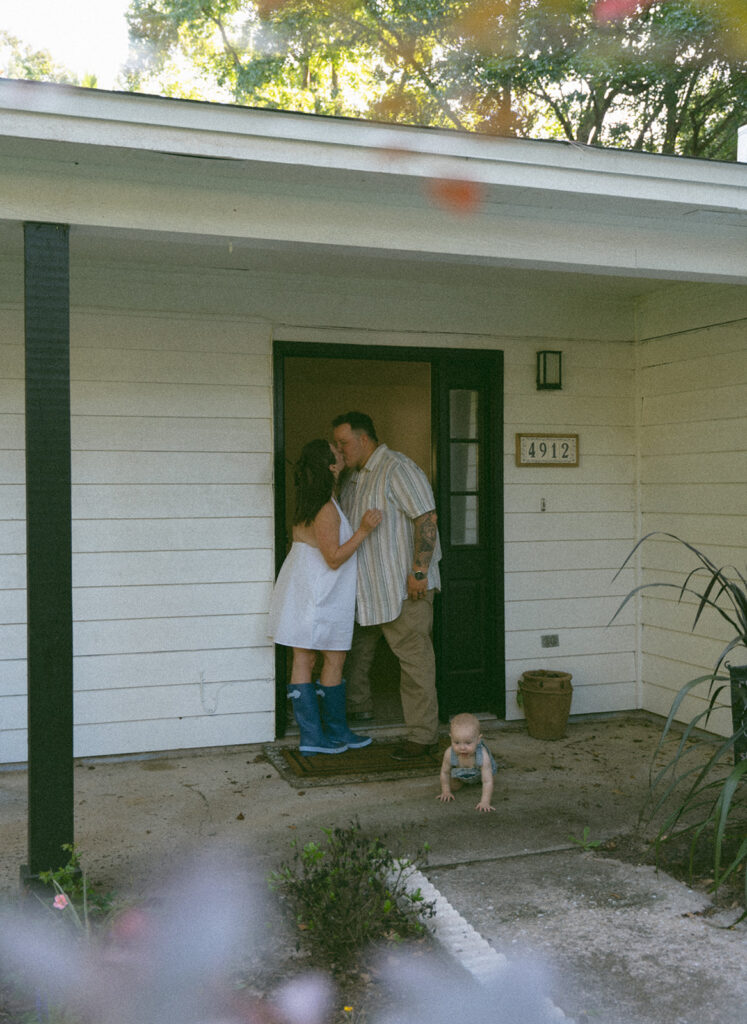 family pictures on the porch with baby
