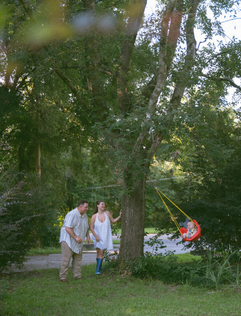 outdoor family pictures with mom and dad and baby