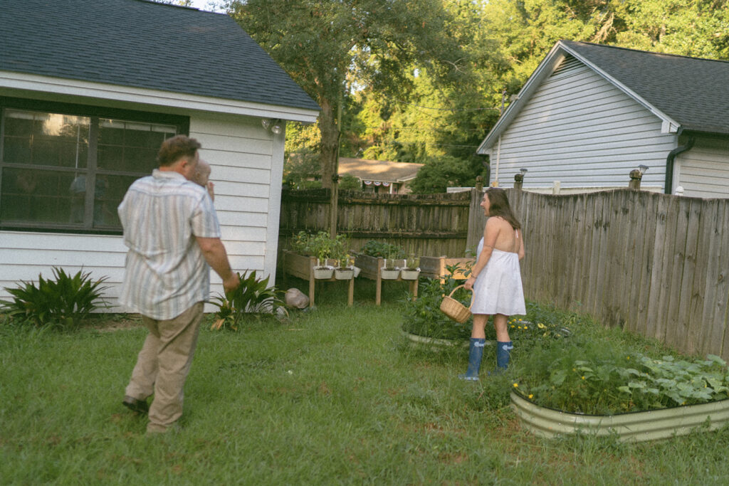 family gardening in their backyard
