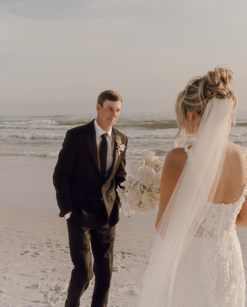 dreamy beach wedding photos with the bride and groom