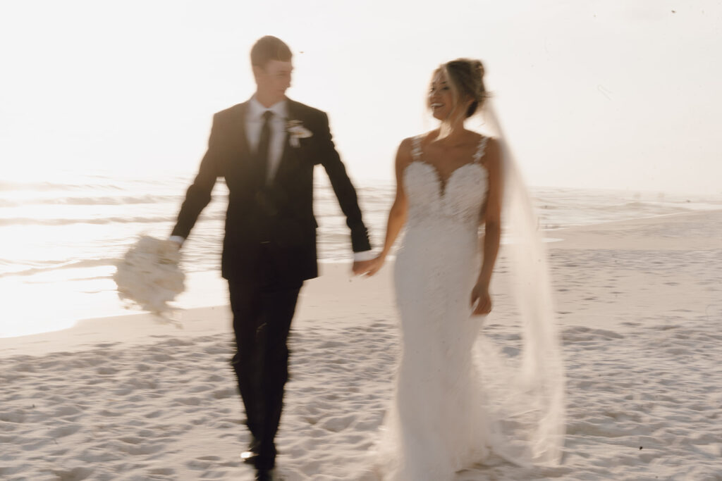 dreamy beach wedding photos with the bride and groom