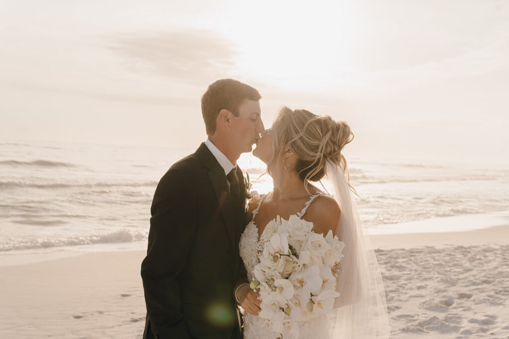 dreamy beach wedding photos with the bride and groom