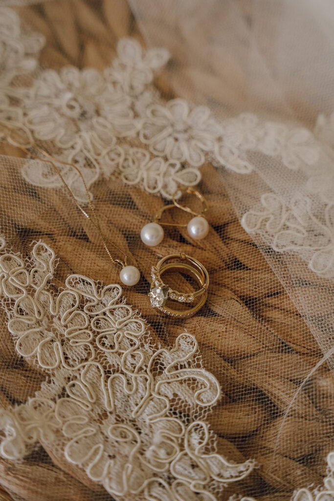 wedding rings and veil detail photos