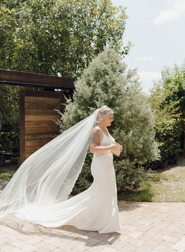 bride walking to first look