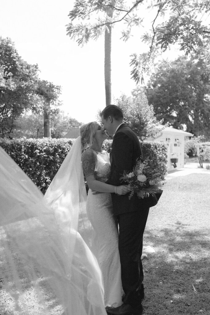 bride and groom brushing noses sunset portraits