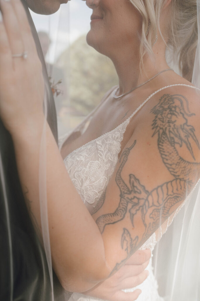 wedding veil photos with the bride and groom