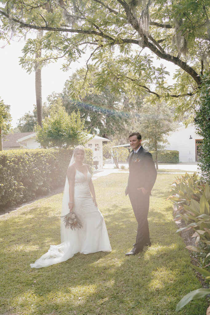 wedding veil photos with the bride and groom