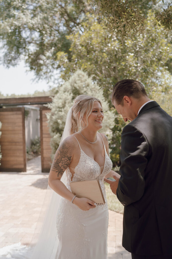 bride and groom sharing private vows