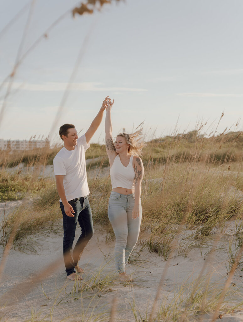 romantic sunset engagement photos at cocoa beach in florida
