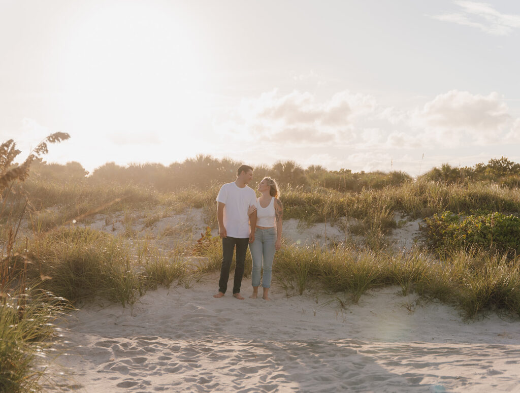 romantic sunset engagement photos at cocoa beach in florida