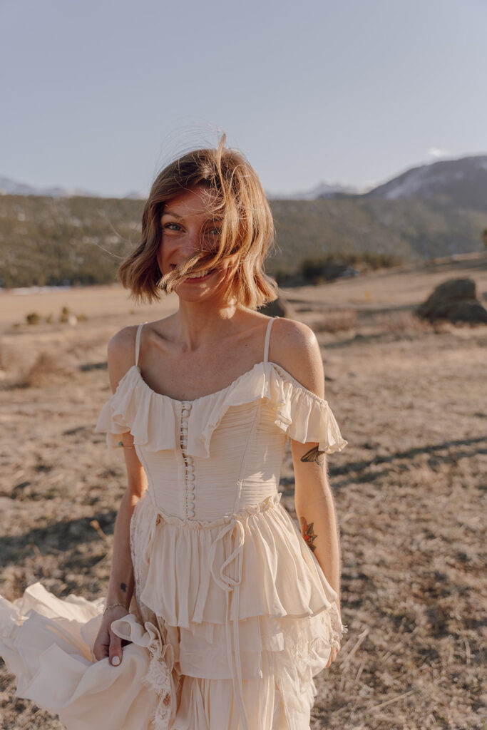 candid bride photo smiling in the mountains
