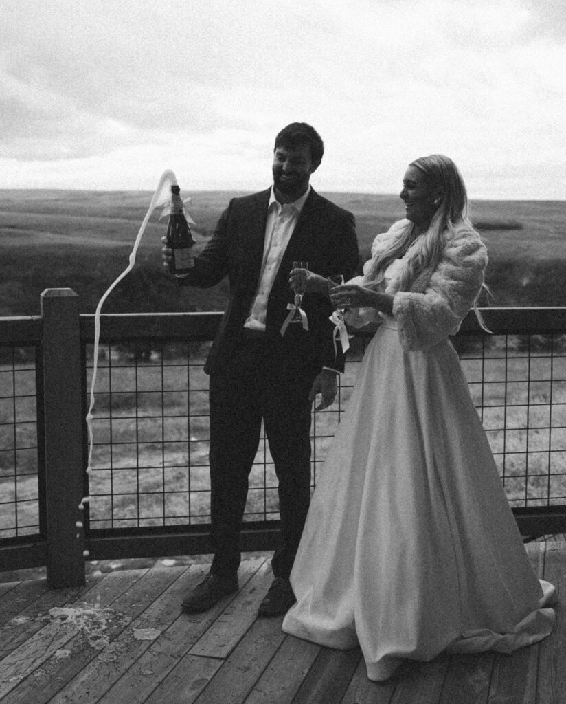 film inspired wedding photo of popping champagne