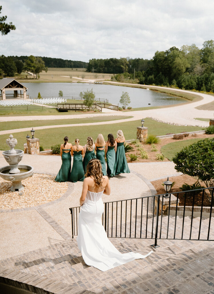 bride dancing with bridesmaids on the wedding day