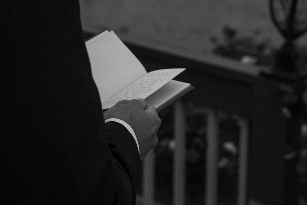 groom reading private vows to bride