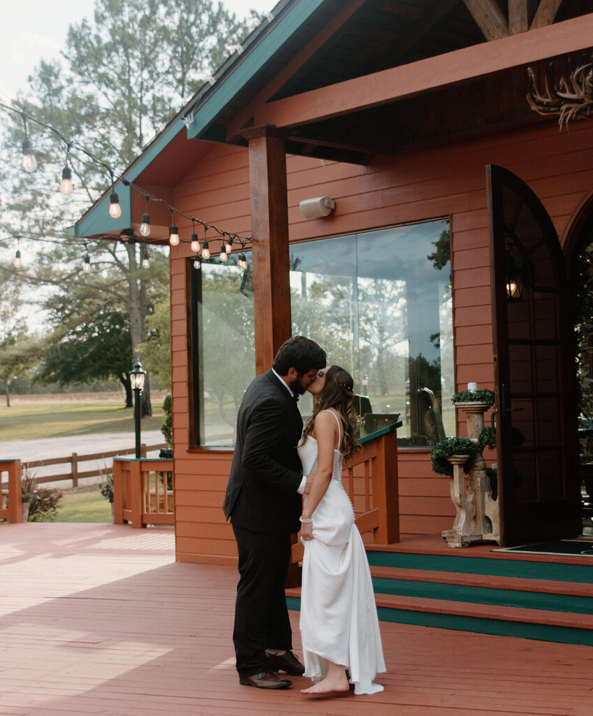 dreamy golden hour wedding reception photos documentary style with cafe lights at a georgia wedding venue