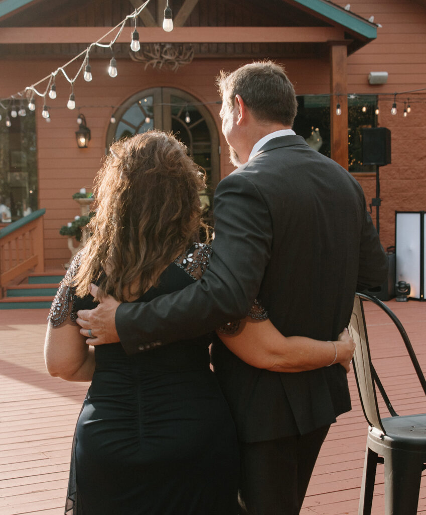 dreamy golden hour wedding reception photos documentary style with cafe lights at a georgia wedding venue