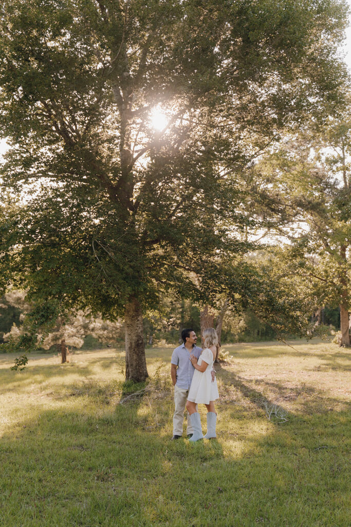 couple posing for engagement session in tallahassee