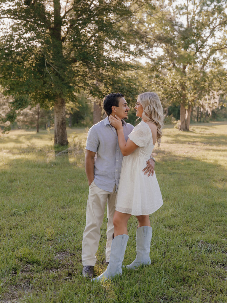 couple posing for engagement session in tallahassee