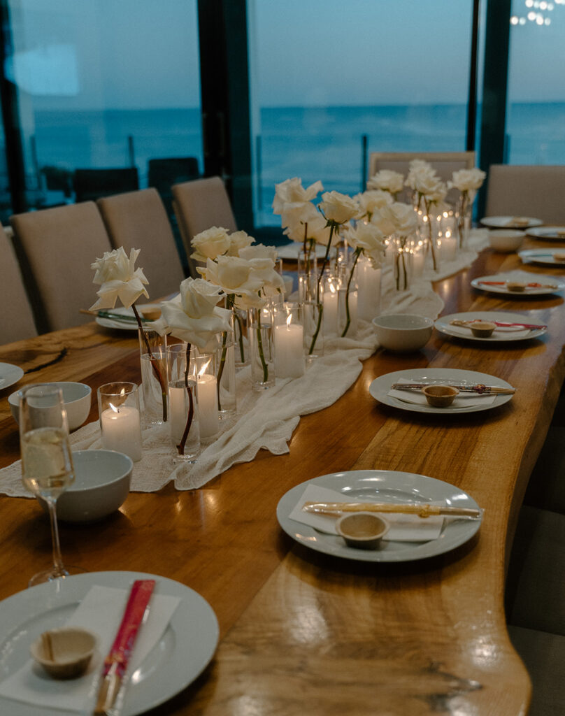 intimate rosemary beach florida wedding reception table with family and friends