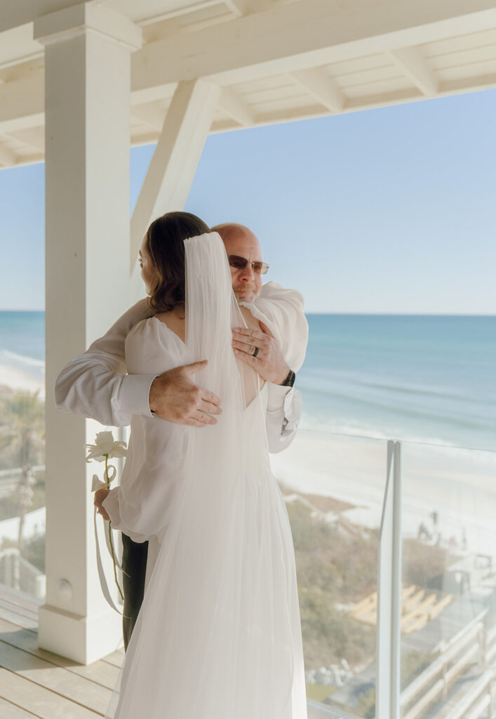 Documentary style wedding photography capturing a first look at an Alys Beach wedding
