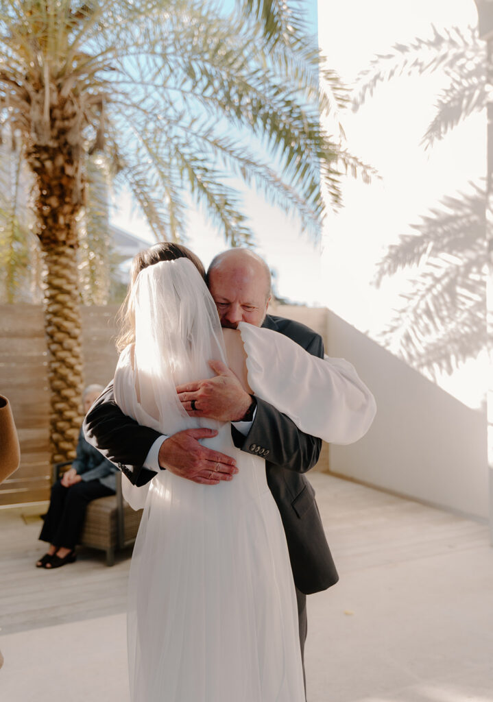Emotional family moments during an intimate Alys Beach wedding