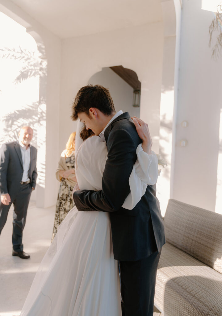 Emotional family moments during an intimate Alys Beach wedding