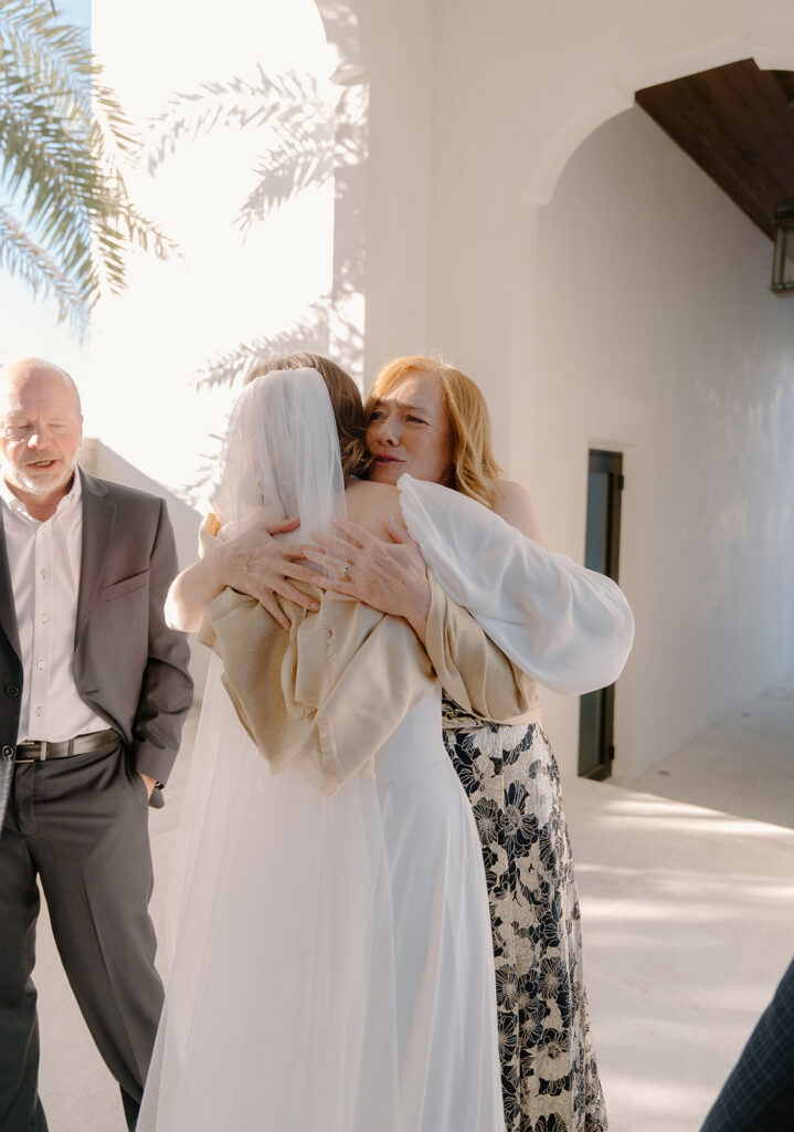Emotional family moments during an intimate Alys Beach wedding