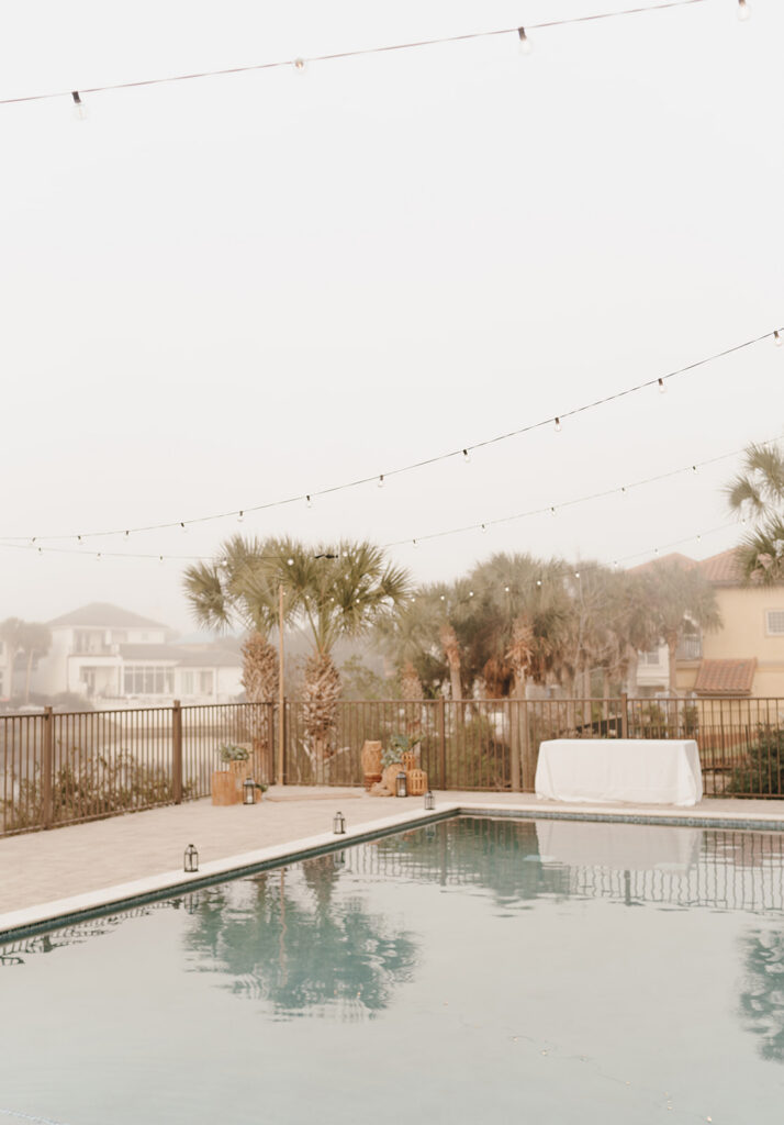 Bahamas wedding ceremony setup by a pool.