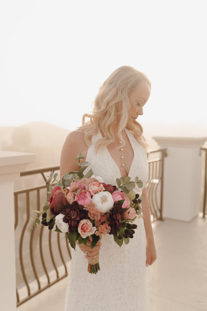 Bride holding a beautiful bouquet at her destination wedding in the Bahamas.