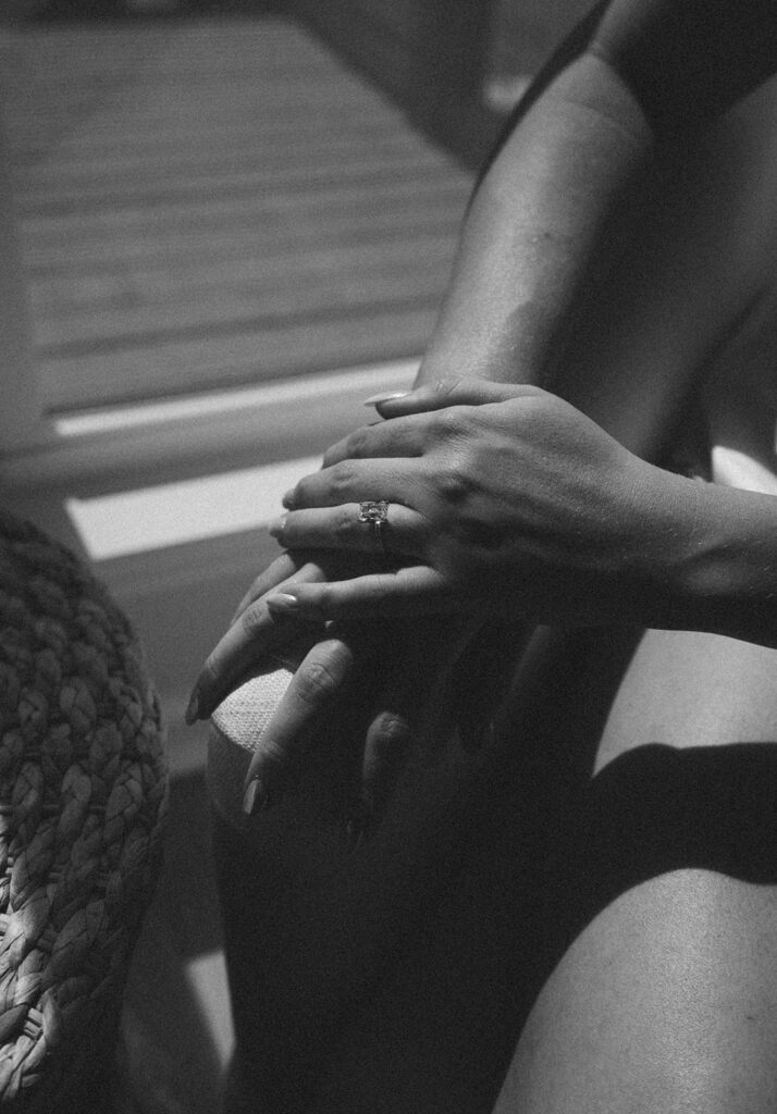 Bride's ring shining by the window.