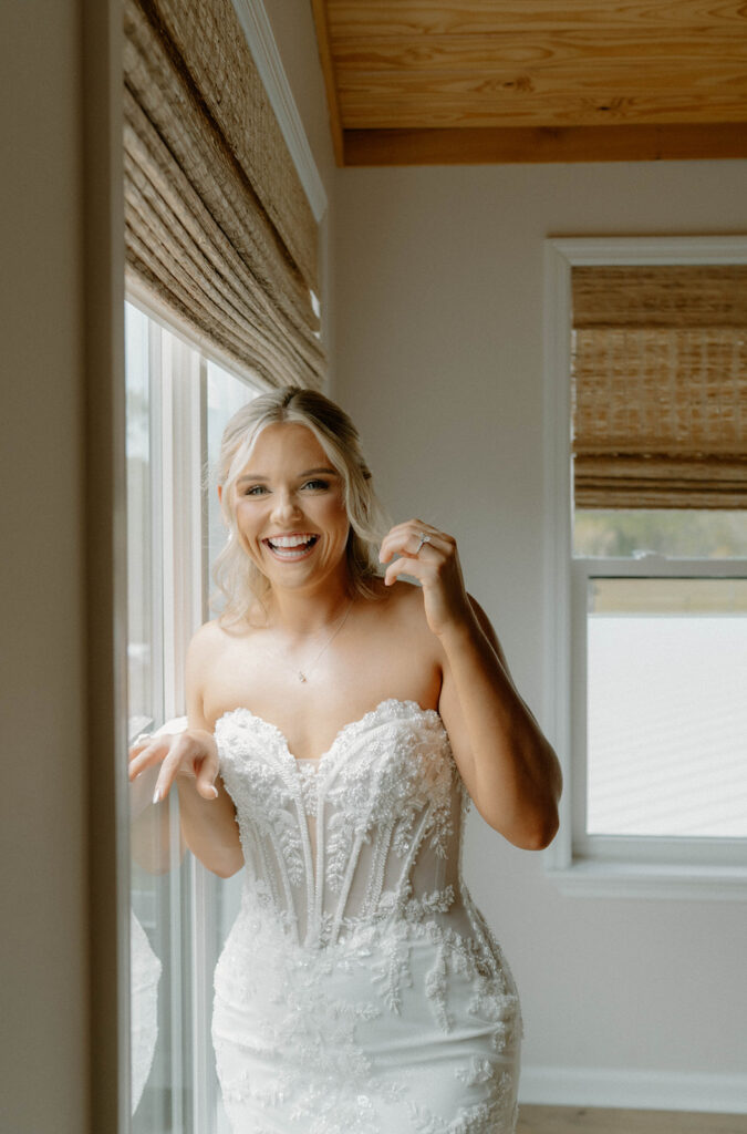 Bride smiling because she's ready for the wedding.