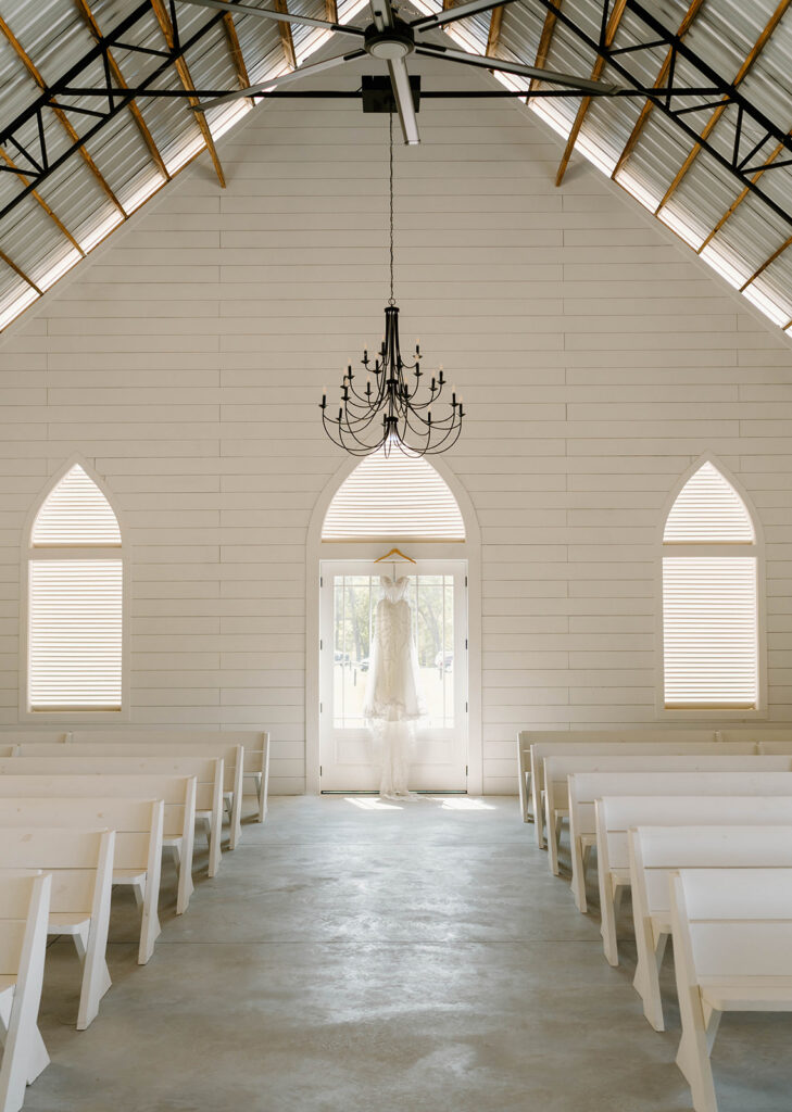 Wedding gown hanging in the chapel at Mount Pleasant Lodge.