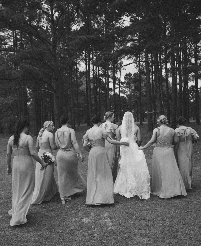 Bridal party walking from behind.
