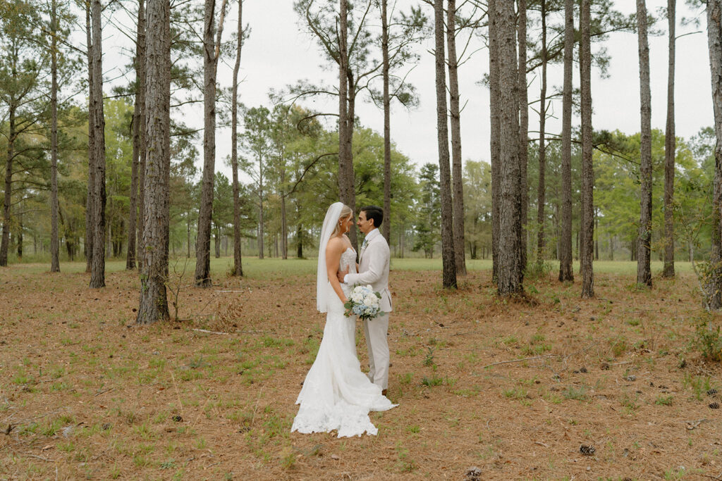 Bride and groom looking into one each others eyes.