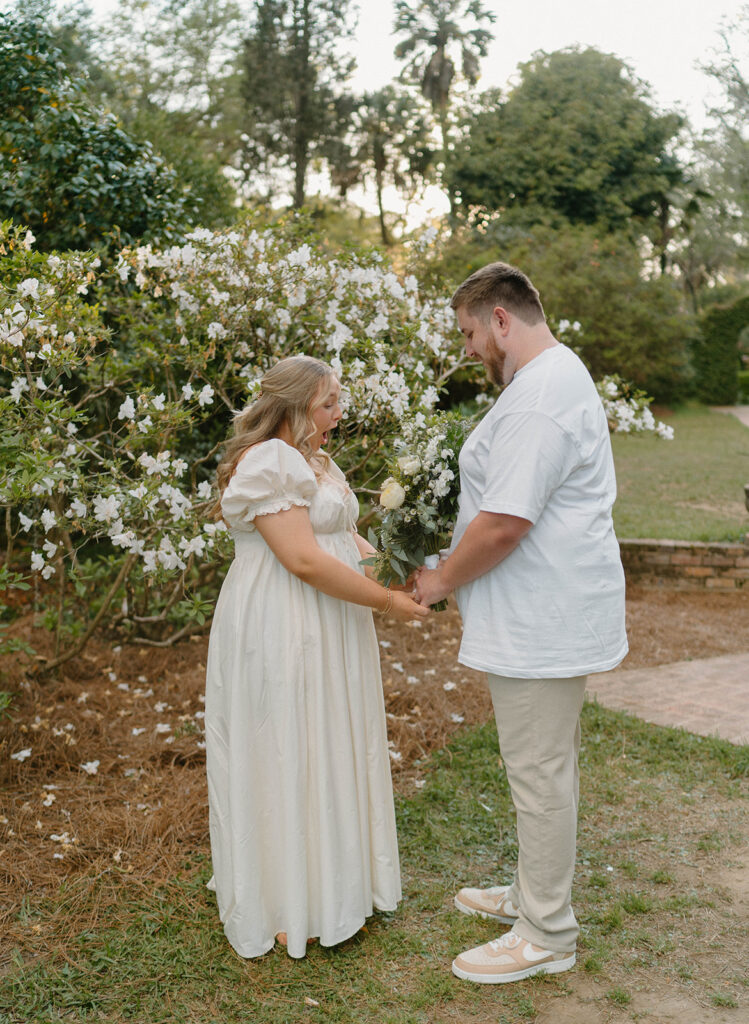 Pregnancy announcement photos of an intimate gender reveal. 