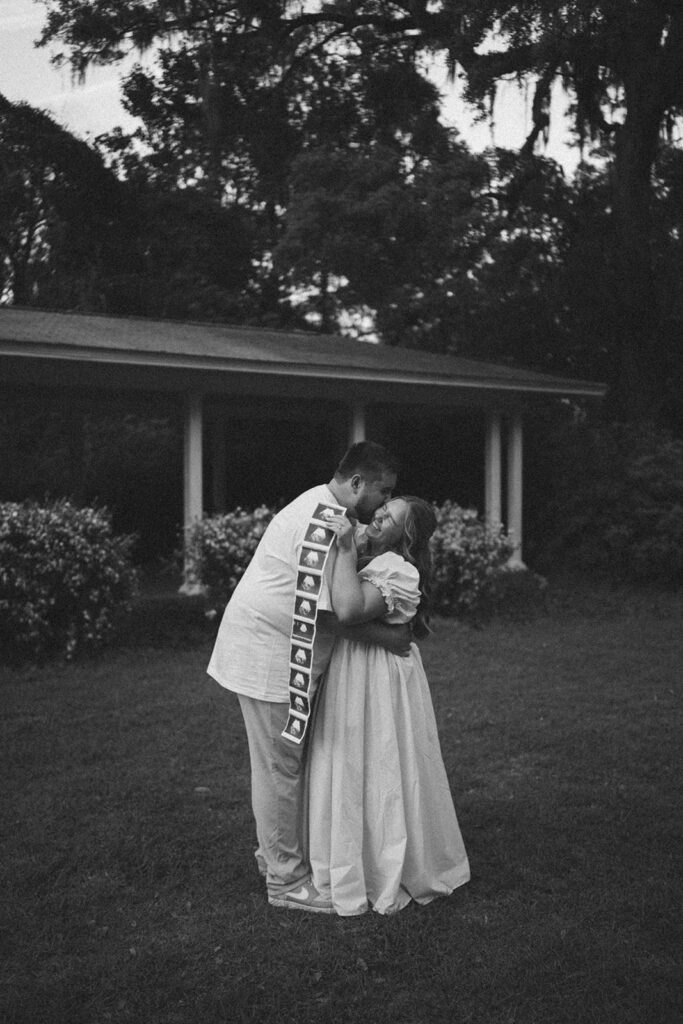 Pregnancy announcement photos of a couple hugging and smiling. 