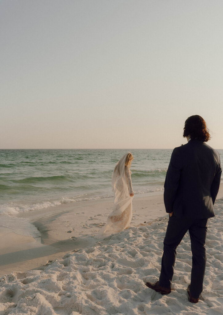 Groom admiring his bride. 
