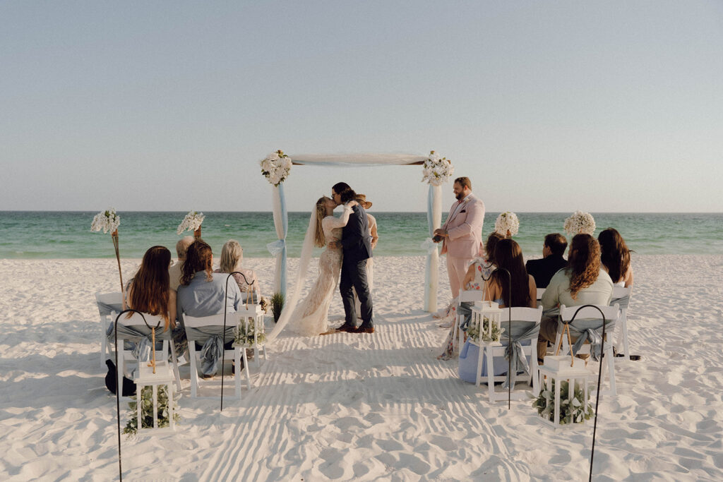 An intimate beach elopement ceremony at Fort Walton Beach, FL.